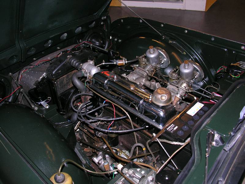 Detail d: Triumph TR4 Roadster, EZ: 07/63, 100 PS, Roadsterverdeck und Surry-Top (sehr selten), Ledersitze, Chromspeichen, Tachostand: 46.646 ml.(abgelesen), ...