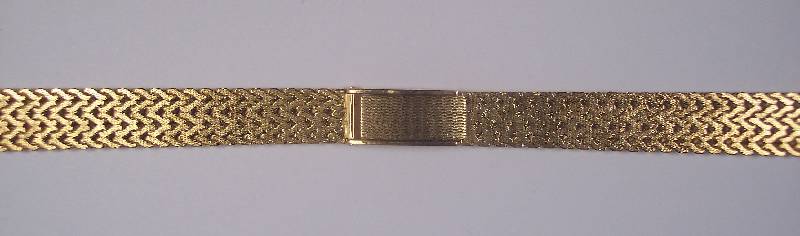Uhrenarmband, GG 750/000, total ca. 24.2 g, L ca. 16.5 - 15.5 cm, Stegbreite ca. 14 mm