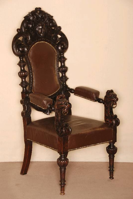 Prunksessel, deutsch/wohl Berlin, um 1880, Eiche massiv, auf gedrechselten Beinen, Armlehnen mit LÖwenkopfschnitzerei, RÜckenlehne mit ...