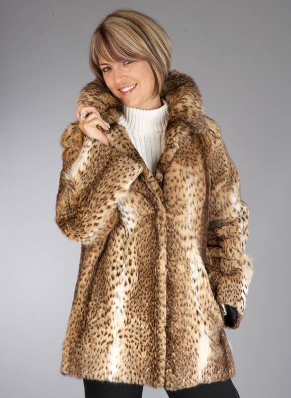 Jacke aus Geoffroy-Katze, Gr. ca. 38/40, Kragen, 2 Einschubtaschen, schwarzes Innenfutter, RÜckenl. ca. 74 cm, CITES-Be- scheinigung liegt vor, ...
