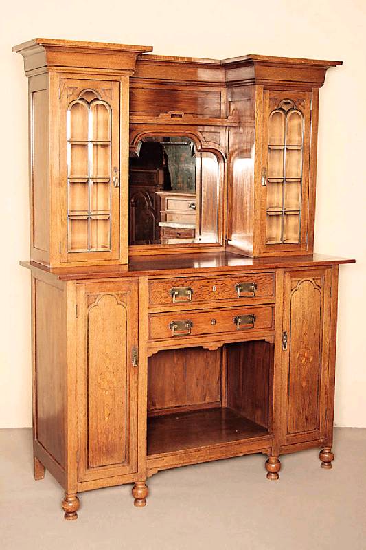 Aufsatzschrank, Holland, um 1910, Amsterdamer Schule, Eiche massiv, auf kugelförmigen Füßen, Unterteil 2-türig mit kassettierten Füllungen, ...