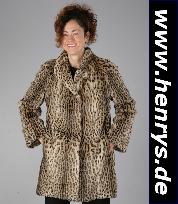 Ozelot-Longjacke, Gr. ca. 38, braunes Innenfutter, Label: Kunze Mannheim, Kragen mit Zierknopf aus Ozelot, 2 seitl. Einschub- taschen, Rückenlänge ...