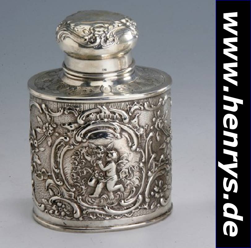 Tabakdose, deutsch, Hanau um 1900, 830er Silber, in Kartuschen Puttendarstellungen, reich floral verziert, Handarbeit, H. ca. 13 cm, ca. 245 g