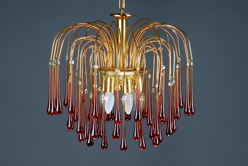Deckenlampe, 2.H.20.Jh., reicher Behang von bernsteinfarbenen Tropfen, 5 Brennstellen, H.ca.44cm, Fu.nicht gepr., l.Alterssp.
