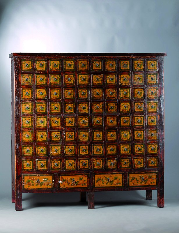 Apothekerschrank, um 1900, Tropenholz, 84 Schübe, orig. Bemalung, diese teils besch., Furniersch., Alterssch., ca. 177x177x70 cm