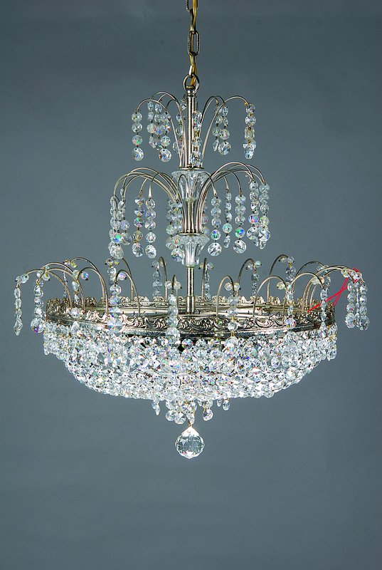Deckenlampe, wohl Spanien, Mitte 20. Jh., Metall, mit reichem Kristallgehänge, Mittelteil in Baldachinform, 8 Brennstellen, H. 55 cm D. 50 cm, ...