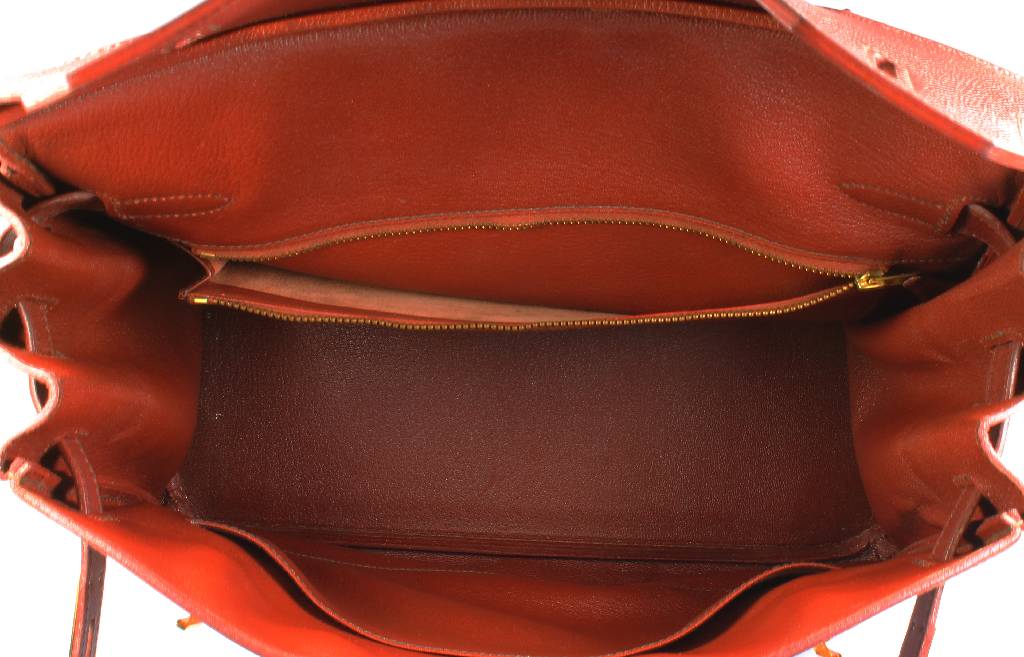 Detail b: HERMES sac haut a courroie, dunkelbraunes Leder, Innenfach (lt. fleckig), Seitentasche mit Reißverschluß, Gebr.-Spuren, ca. 33 x 29 x 17 cm, mit ...