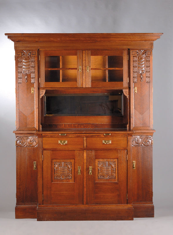 Aufsatzbuffet, Jugendstil um 1905, Eiche massiv, Kopf 6-fach getreppt, Aufsatz 4 -türig mit mittigem facettiertem Spiegel, mittige Türen Türen mit ...