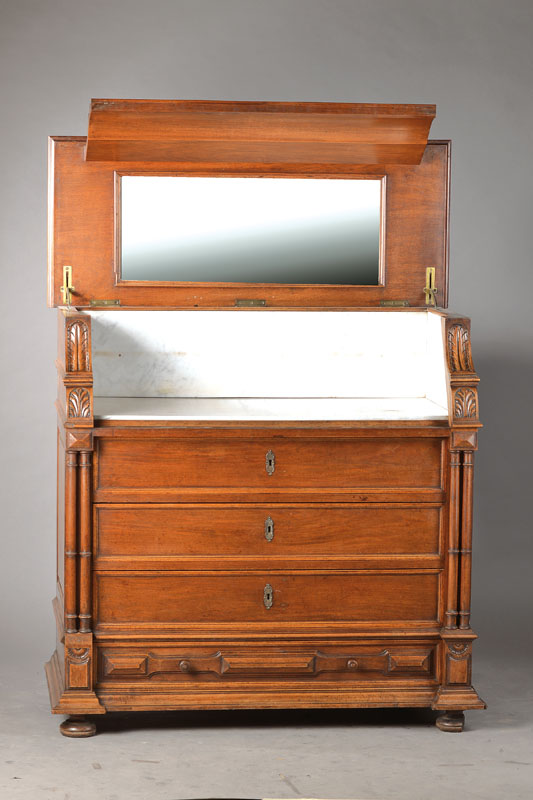 Waschmöbel, Elsass, um 1880/90, Nussbaum massiv, Platte aufklappbar mit innenseitigem Spiegel u. Marmorauskleidung, Unterteil 4- schübig, seitl. je ...