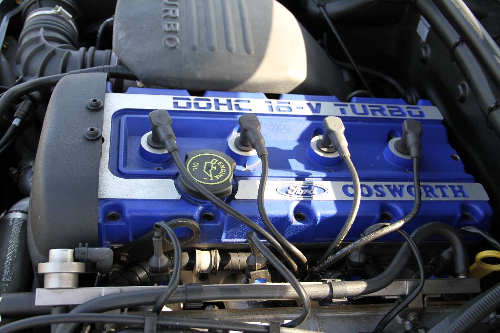 Detail c: Ford Escort RS Cosworth, EZ 26.08.1993, 1. Hand, Laufleistung ca. 8.635 km, 162 KW/ 220 PS, Schaltgetriebe, mallardgrün metallic, Vollleder ...