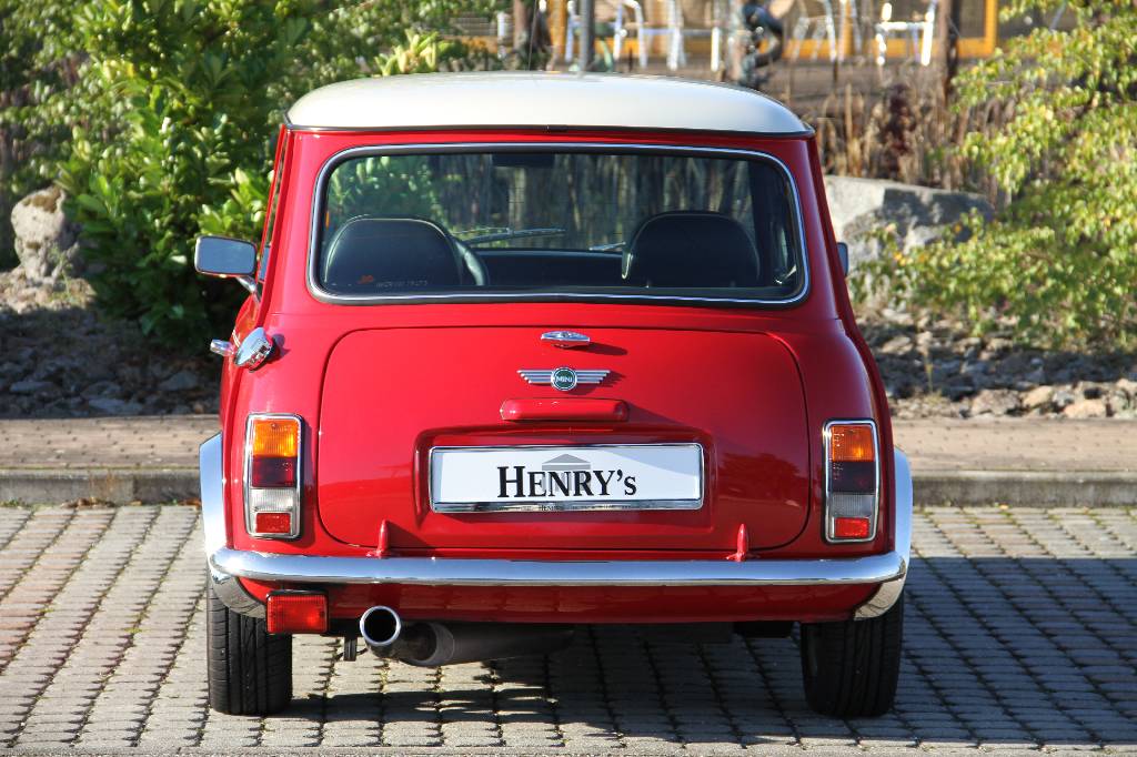 Detail c: Mini Cooper MK VII, EZ 11.1999 Laufleistung ca. 115.905 km, 46 kW/ 63 PS, 4-Gang Schaltgetriebe, rot mit weißem Dach, Kunstleder schwarz/beige, ...