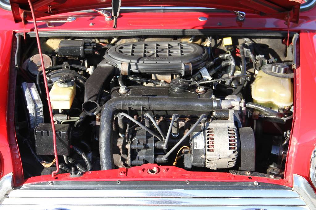 Detail h: Mini Cooper MK VII, EZ 11.1999 Laufleistung ca. 115.905 km, 46 kW/ 63 PS, 4-Gang Schaltgetriebe, rot mit weißem Dach, Kunstleder schwarz/beige, ...