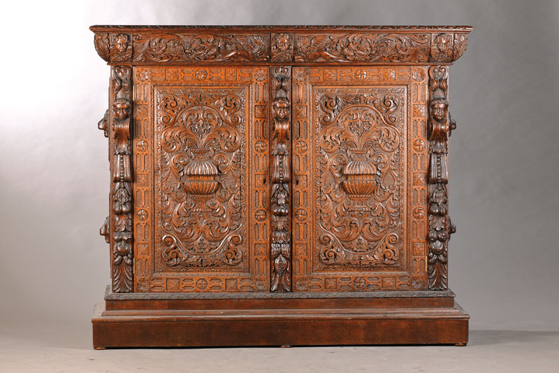 Vielzweckschrank, wohl Holland/Belgien, um 1890, Eiche massiv, überreiche beschnitzt, 2-türig, wohl ehemals Aufsatzschrank umgebaut, 3-fach durch ...