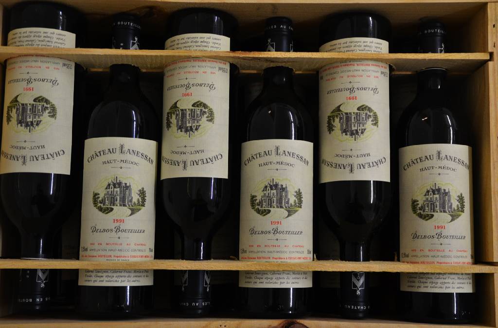 12 Flaschen 1991 Chateau Lanessan, Haut -Medoc, unverkostet, je ca. 75cl, je into Neck, in Originalholzkiste