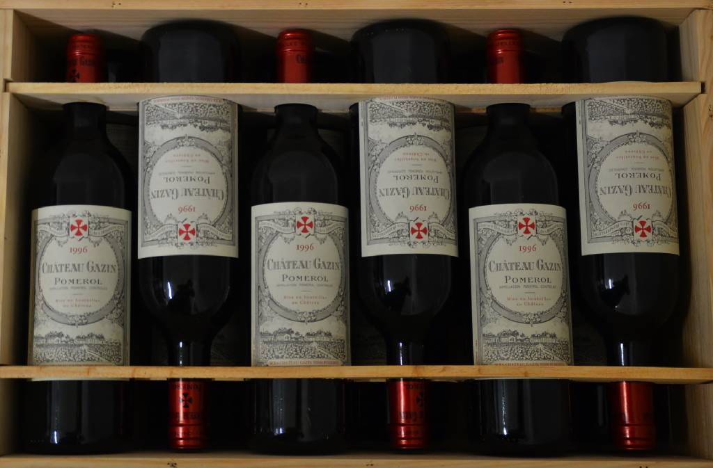 12 Flaschen 1996 Chateau Gazin, Pomerol, je ca. 75 cl, je into neck, unverkostet, in Originalholzkiste, mit Broschüre über das Weingut, ...