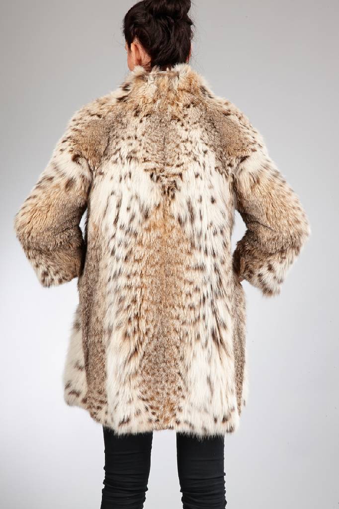 Detail a: Luchskatzenjacke, Gr. ca. 36, cremefarbenesInnenfutter, Pelzhaus, KUNZE Mannheim, 2 seitl. Einschubtaschen, Rückenl. ca. 88 cm, Lt. EU-Vo.-Nr. ...