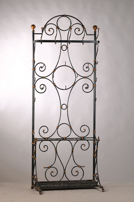 Garderobe, deutsch, um 1900/10, Eisen, vielfach geschweifte Montur mit mehreren Hakenu. Schirmständer, l. korrodiert, ca. 212x80x45cm