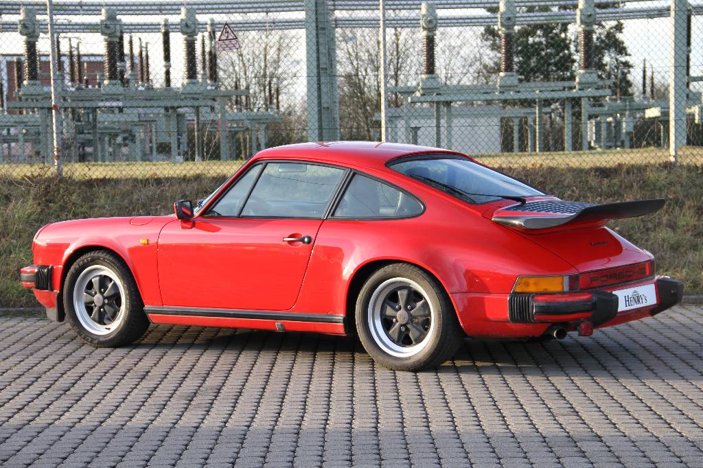 Detail c: Porsche 911 Carrera 3.2, EZ 02.1985, Laufleistung ca. 173.000 km, HU 02.2018, H- Zulassung, 170 kW/ 231 PS, 5-Gang Schaltgetriebe, rot, grau, Porsche ...