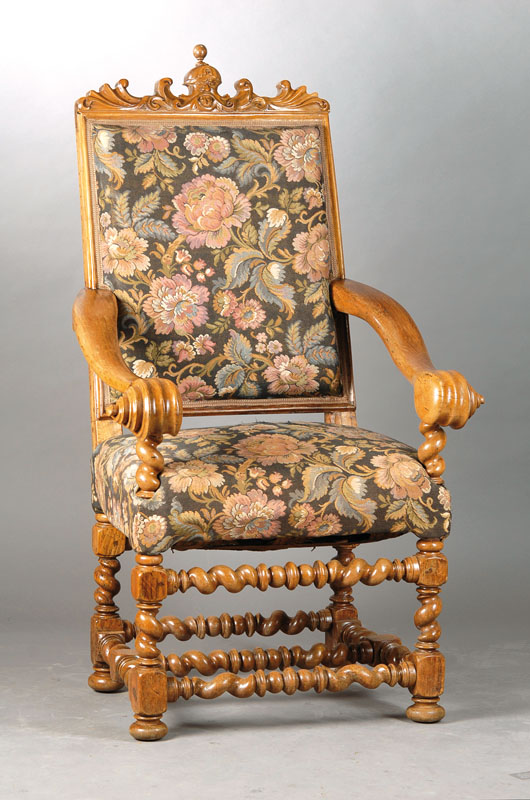 Prunksessel, wohl Italien, um 1680, Frühbarock, Nussbaum massiv, wuchtige gedrechselte Partien, kräftig volutierte Handläufe, Fratzenbekrönung ...