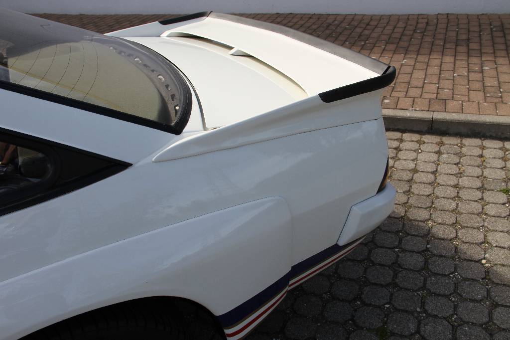 Detail i: Opel Manta i200, EZ 01.1984, Laufleistung ca. 23.623 km abgelesen, H-zulassungsfähig, 92 kW/125 PS, 4-Zylinder, 5-Gang Schaltgetriebe, weiß, ...