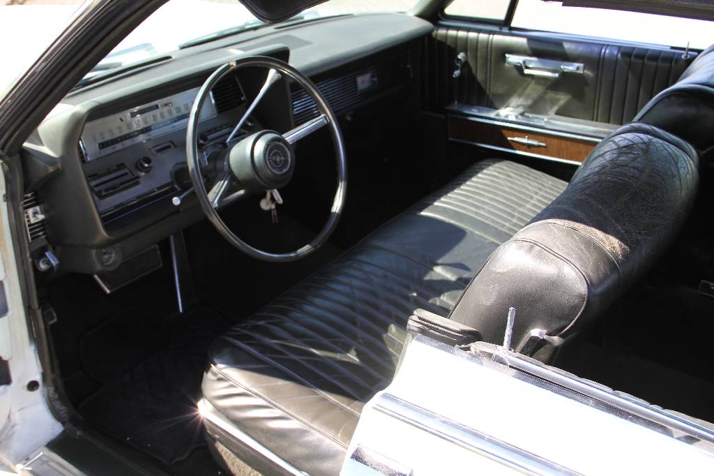Detail c: Lincoln Continental 4-Door Convertible, EZ 07.1967, Laufleistung ca. 69.700 miles abgelesen, H-Zulassung, Automatikgetriebe, weiß, Leder schwarz, ...