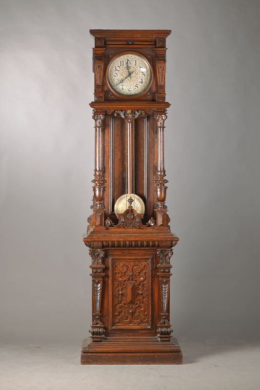 Standuhr, Neo-Renaissance, deutsch um 1880,reich verziertes zweigeteiltes Holzgehäuse , 4 Balusterfüsse fehlen, Bekrönungsteile lose- vollständig ...