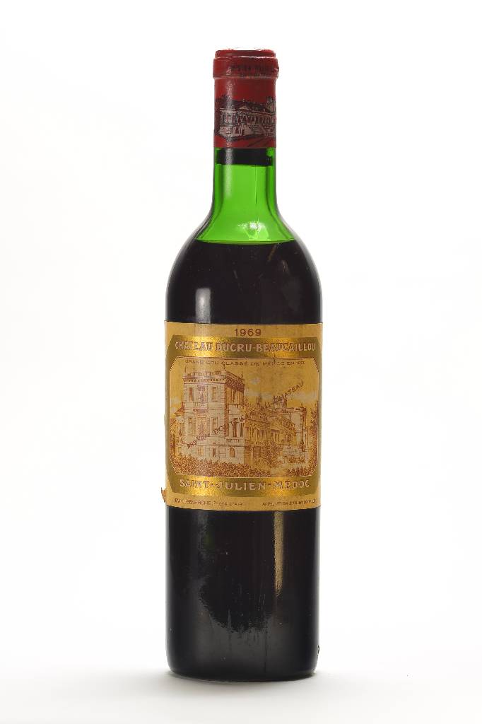 1 Flasche 1969 Chateau Ducru-Beaucaillou, Saint-Julien-Medoc, ca. 75 cl, ca. mid shoulder, Grand Cru Classe en 1855, Kapsel in gutem Zustand, Etikett ...