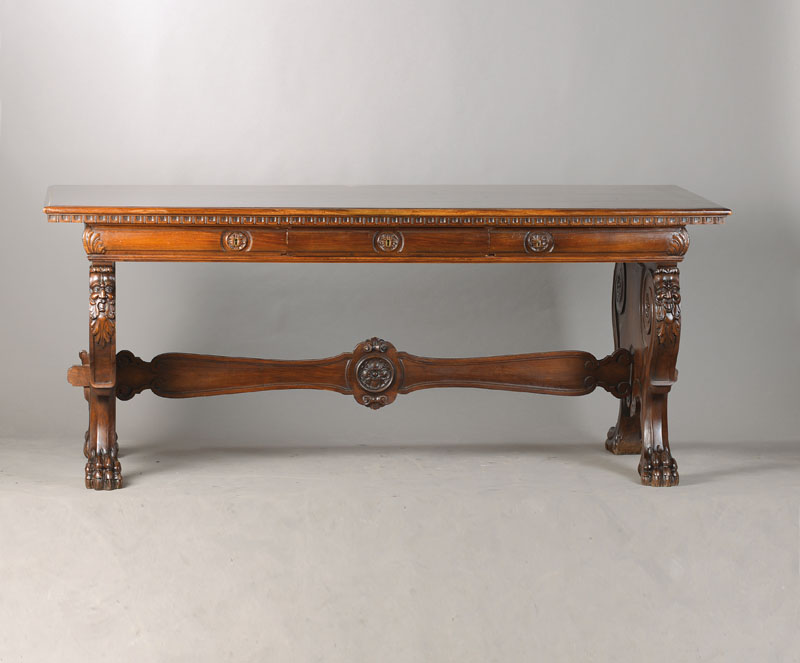 Herrenzimmerschreibtisch, deutsch, um 1925/30, Nussbaum massiv, sog. Wangentisch, im Renaissance-Stil, seitl. Wangen beidseitig mit Maskaronen u. ...