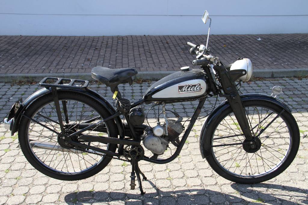 Detail a: Miele K21, Fahrgestellnummer 1004639, EZ 06.1951, Laufleistung ca. 5.596 km abgelesen , 2 kW/ 3 PS, 1- Zylinder, 2-Gang Schaltgetriebe, schwarz, ...