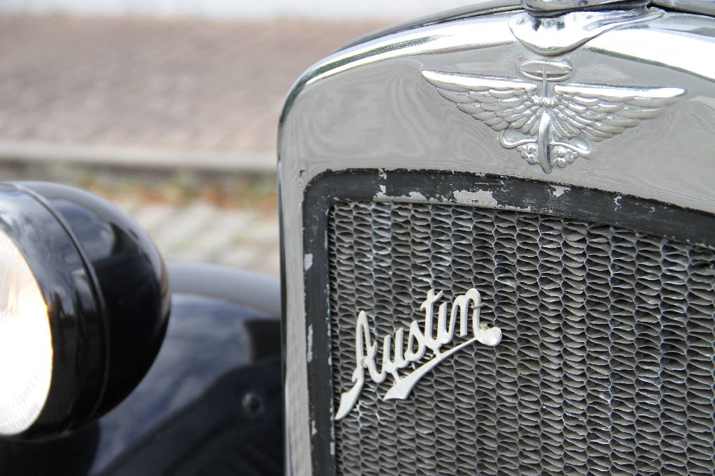 Detail b: Austin 7 Tourer Cabrio, Fahrgestellnummer B62674, EZ 30.07.1932, 2. Hand, Laufleistung k.a. H-Zulassung ja, 8 kW/ 11 PS, 4-Zylinder, 4-Gang ...