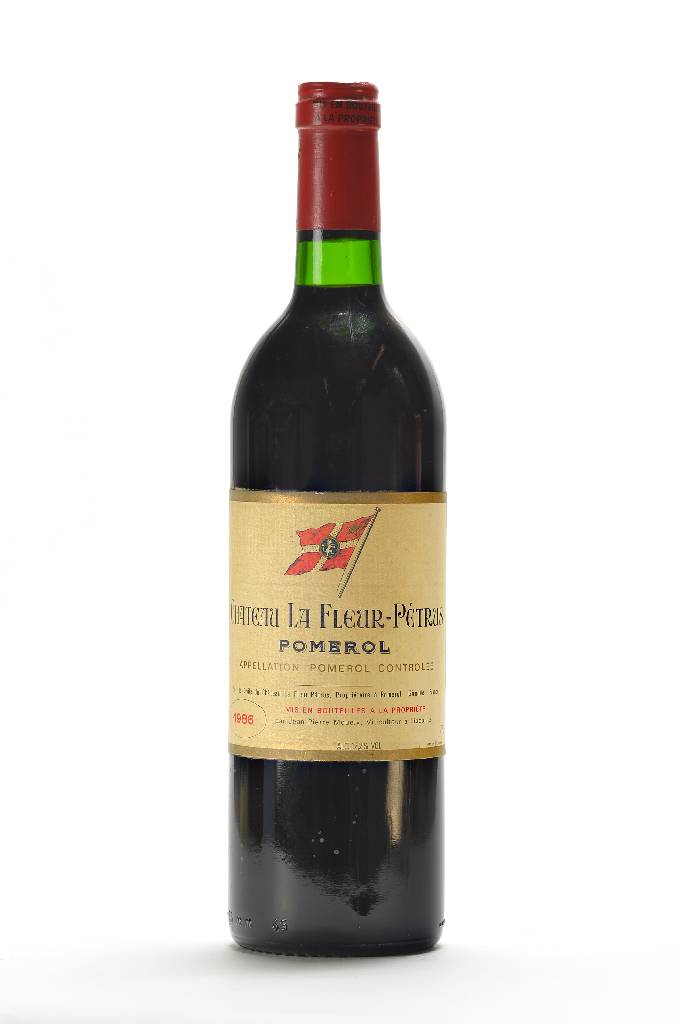 1 Flasche 1986 Chateau La Fleur-Petrus Pomerol, ca. 75 cl, Füllstand: ca. into neck, selten im Angebot, unverkostet, Etikett min. beschmutzt, guter ...