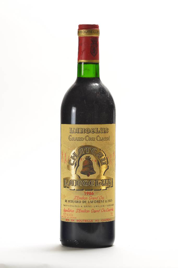 1 Flasche 1986 Chateau Angelus, Saint Emilion, Grand Cru Classe, Füllstand: ca. top shoulder, 12,5 % Vol., min. beschmutzt, guter Erhaltungszustand, ...
