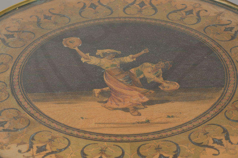 Detail a: Beistelltischchen mit Intarsienarbeit, um 1900, Eichegestell, runde Platte unter Glas mit szenehafter Intarsienarbeit, Darstellung: Tänzerin und ...