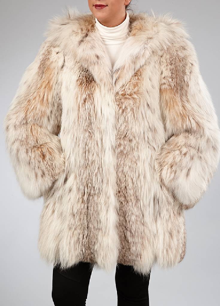 Luchs Longjacke, Gr. ca. 40/42, Felle längsverarbeitet, Label: Fritz Glöckner München, mit Kapuze, zwei Einschubtaschen, beigefarb. Innenfutter, ...