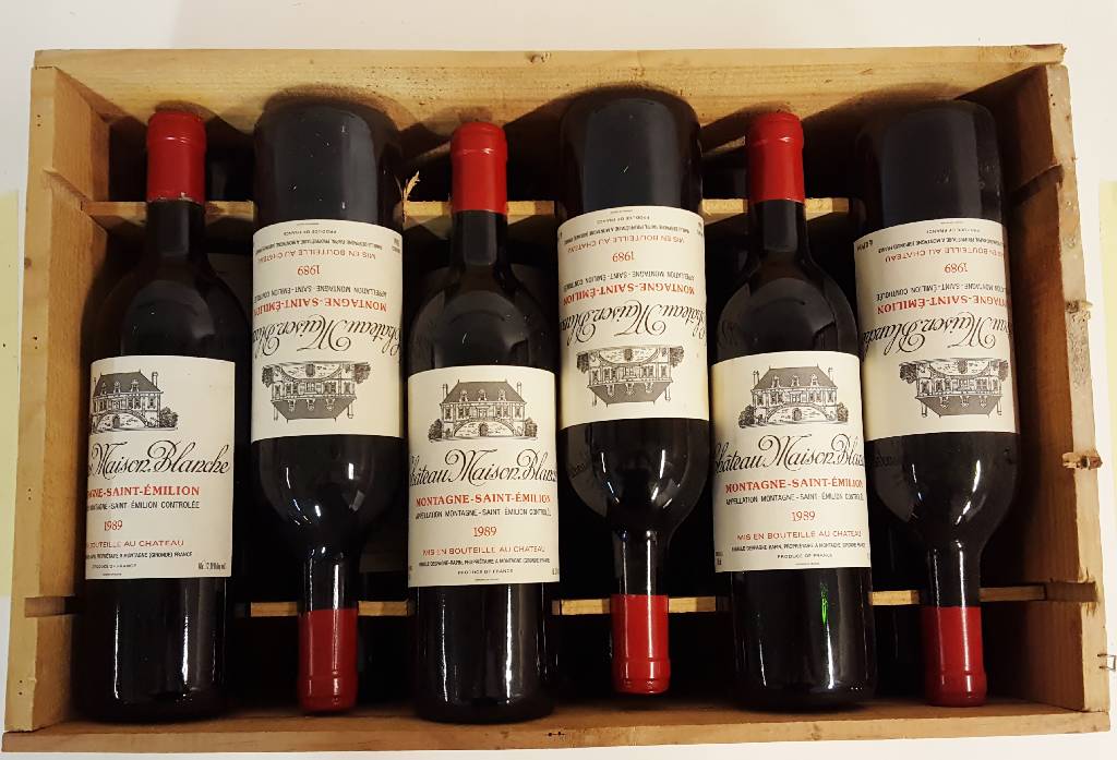 12 Flaschen 1989 Chateau Maison Blanche, Saint-Emilion, je ca. 75 cl, 12,8 % vol., Füllstände: je ca. top shoulder, unverkostet, in der ...
