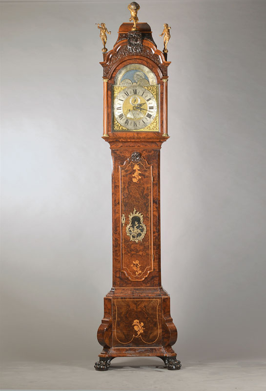 Standuhr, sign.: "Pieter Thymen AmsterDam", Ende 18.Jh., dreiteilig optisch gegliedert, Nußbaumwurzelfurnier, Schnitzereien, geschweifter ...