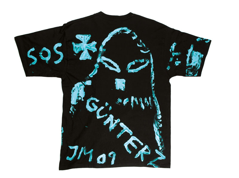 Detail a: Jonathan Meese, geb. 1970, T-Shirt handbemalt, collagiert, sign. J.M., dat. 09, Größe XL, Unikat