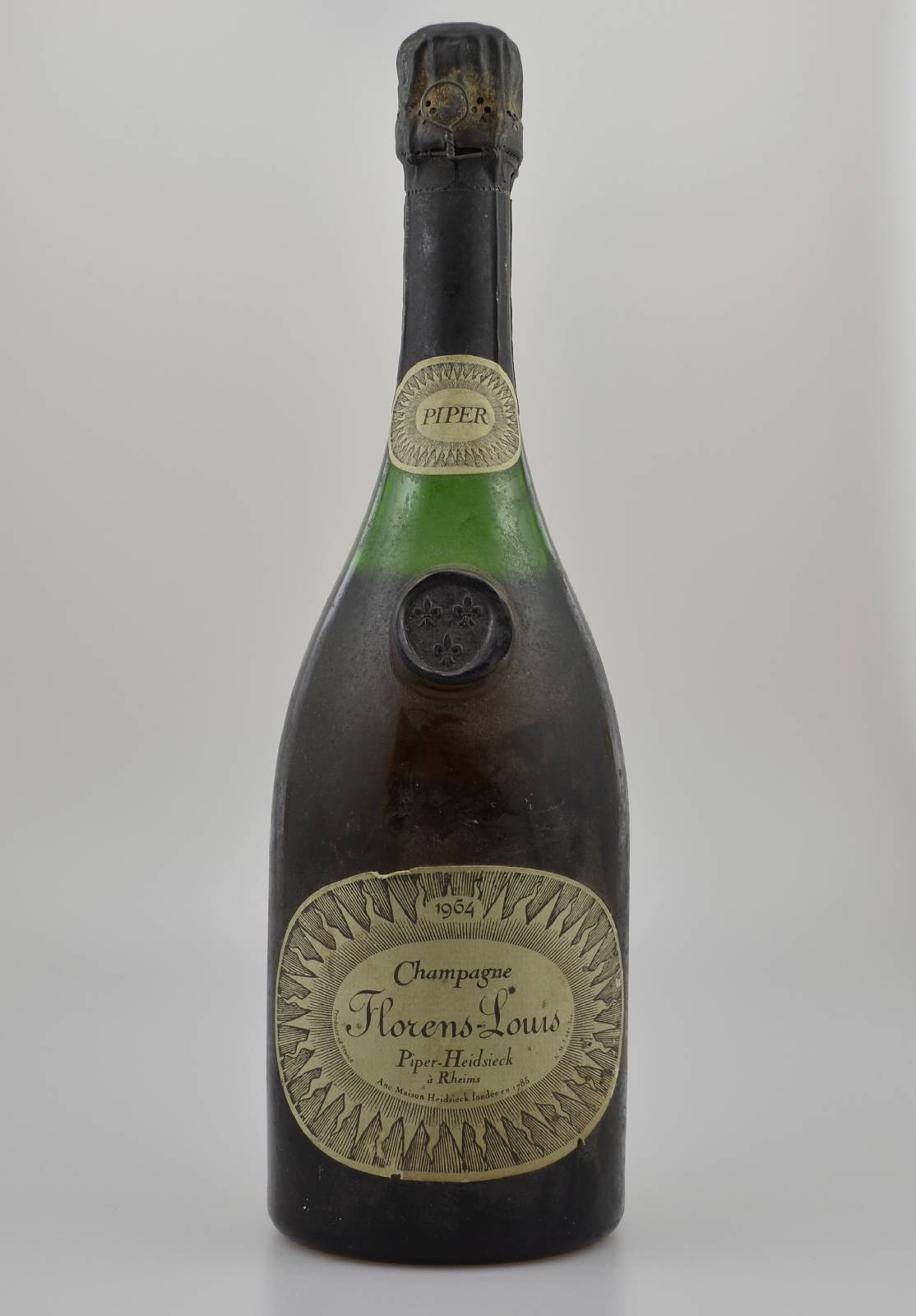 1 Flasche 1964 Piper-Heidsieck Florens-Luis Champagne, Reims, Abstand zwischen Flaschenboden und Champagner: ca. 3 cm, unverkostet, Etikett gebräunt ...