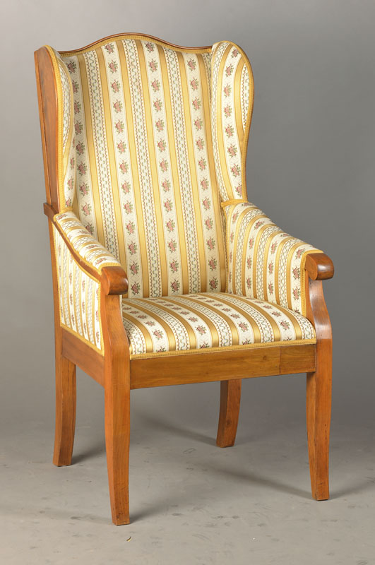 Ohrenbackensessel, als Bergeré ausgeführt, deutsch, um 1900, nach dem Vorbild von 1820, Kirschbaum massiv, Polster u. Bezug i.O., H. ca. 119 cm, ...
