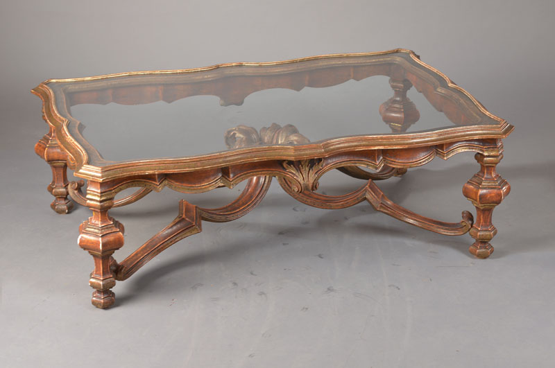 Couchtisch, im italienischen Stil, sp. 20. Jh., Holz handgeschnitzt u. marmoriert, in plastischer Akanthusblattausformung, mit Glasplatte, ...