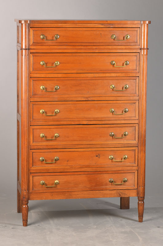 Schubladenkommode, sog. Semaniere, wohl Frankreich, um 1870, Kirschbaum, vordere Stollen als 3/4-Säulen ausgearbeitet u. kanneliert, 7-schübig, ...