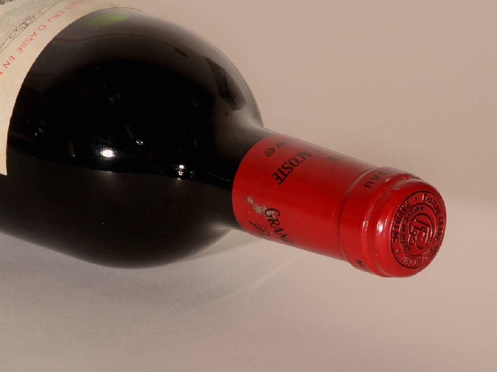 Detail a: 1 Flasche 1990 Chateau Grand-Puy-Lacoste, Pauillac, ca. 75 cl, 12,5 % Vol., Füllstand: ca. into neck, unverkostet, sehr guter Erhaltungszustand, 95 ...