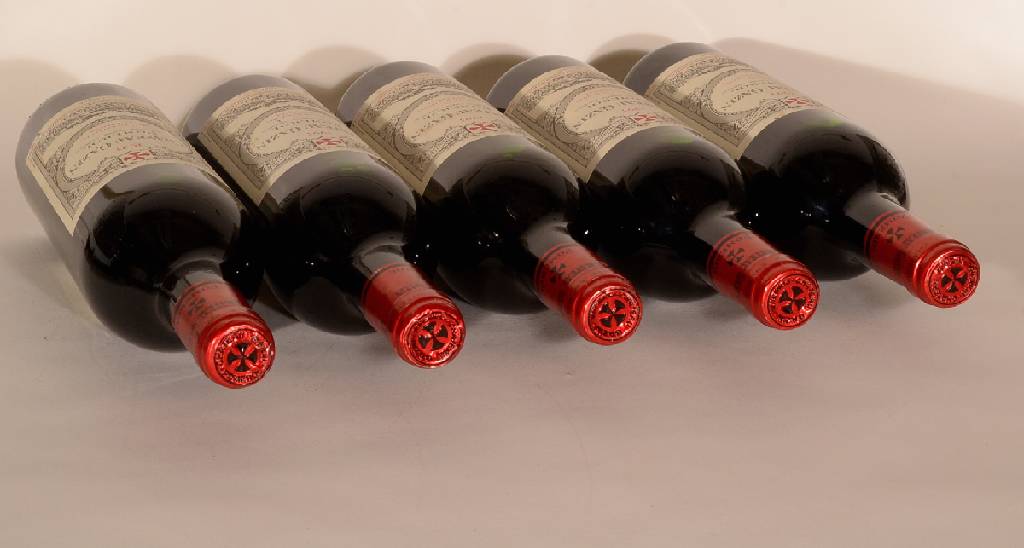 Detail c: 5 Flaschen 1995 Chateau Ganzin, Pomerol, je ca. 75 cl, 13 % Vol., unverkostet,Füllstände: je ca. into neck, Kapseln teilweise l. berieben sons sehr ...