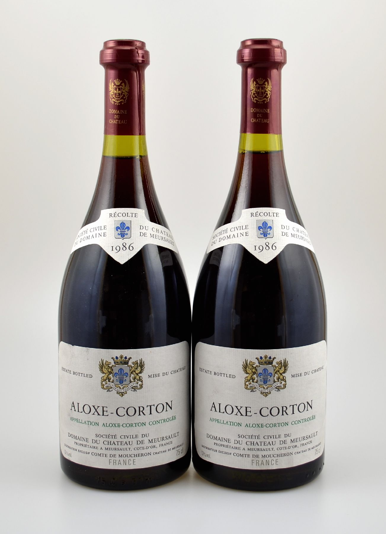 2 Flaschen 1986 Aloxe Carton Chateau de Meursault, je ca. 75 cl, 13 % Vol., unverkostet, Abstand zwischen Kapsel und Wein: ca. 1-1,5 cm, sehr gute ...