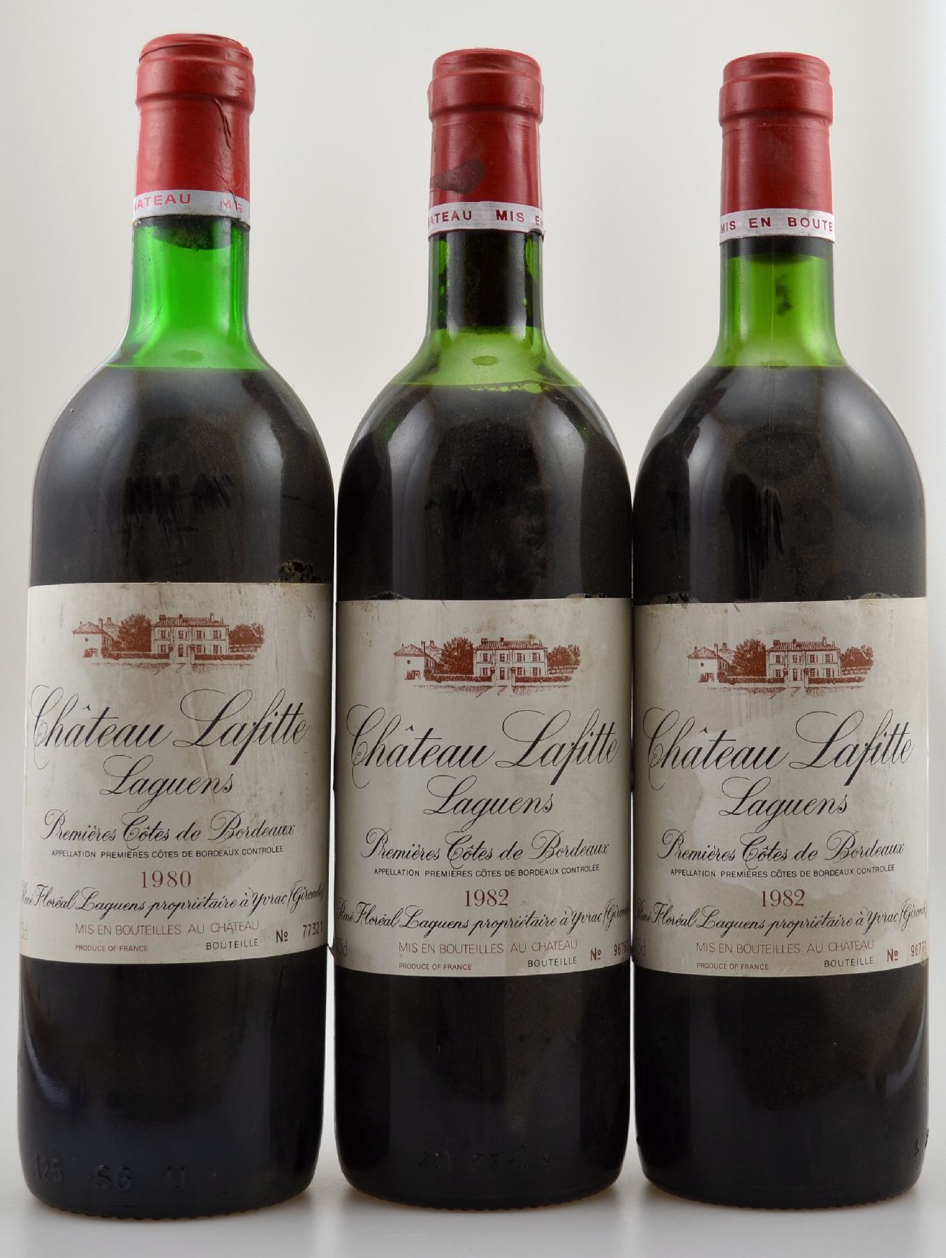 9 Flaschen Chateau Lafitte Laguens, Jahrgänge: 7 x 1982 & 2 x 1980, je ca. 75 cl, Füllstände: upper mid shoulder bis top shoulder, Etiketten l. ...