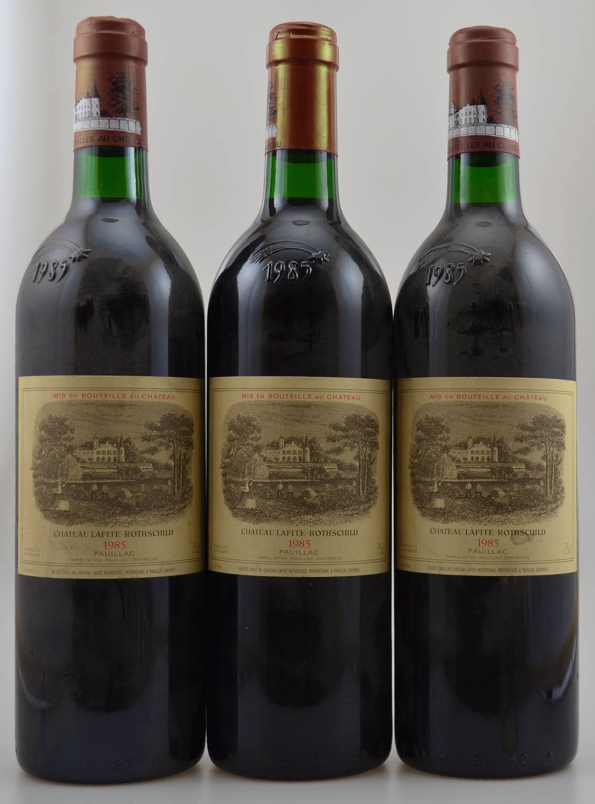 3 Flaschen 1985 Chateau Lafite Rothschild, Pauillac, Premier Grand Cru Classe, je ca. 75 cl, Füllstände: je ca. into neck, Etiketten min. besch., ...