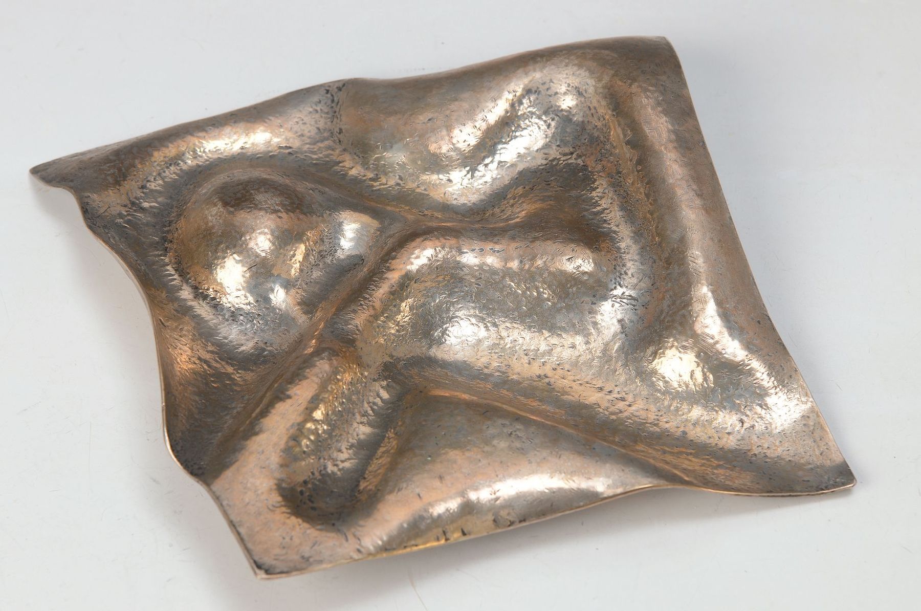 Heinz Brzoska, 1942 Kattowitz-2015, Abstraktes Relief, versilberte Metallplatte in Treibarbeit, ca. 20x20cm