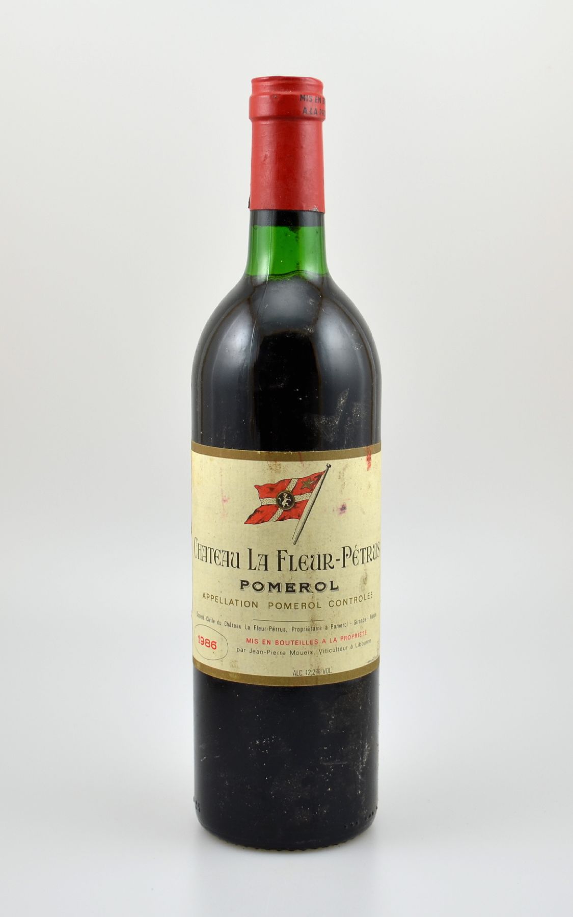 1 Flasche 1986 Chateau La Fleur-Petrus, Pomerol, ca. 75 cl, Füllstand: ca. top shoulder, Kapsel l. besch., Etikett beschmutzt, unverkostet, ...