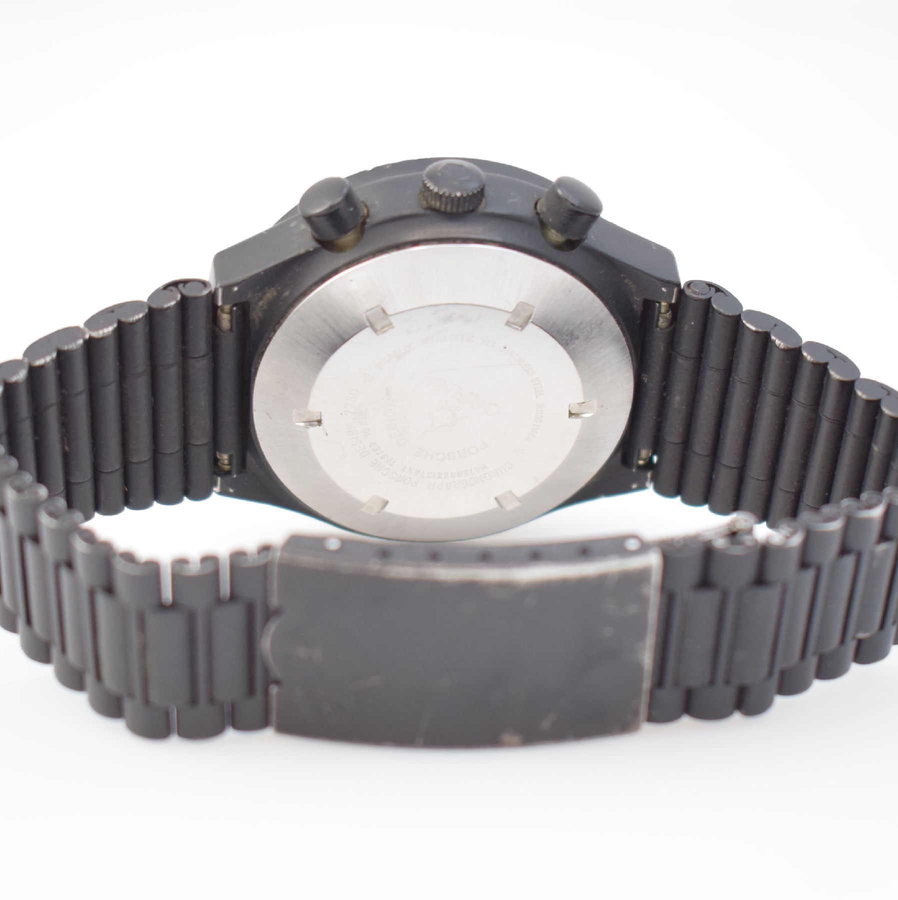 Detail d: ORFINA/PORSCHE DESIGN Herrenarmbanduhr mit Chronograph, Schweiz um 1980, Automatik, geschwärztes Edelstahlgeh. mit orig. Gliederband, Boden geschr., ...