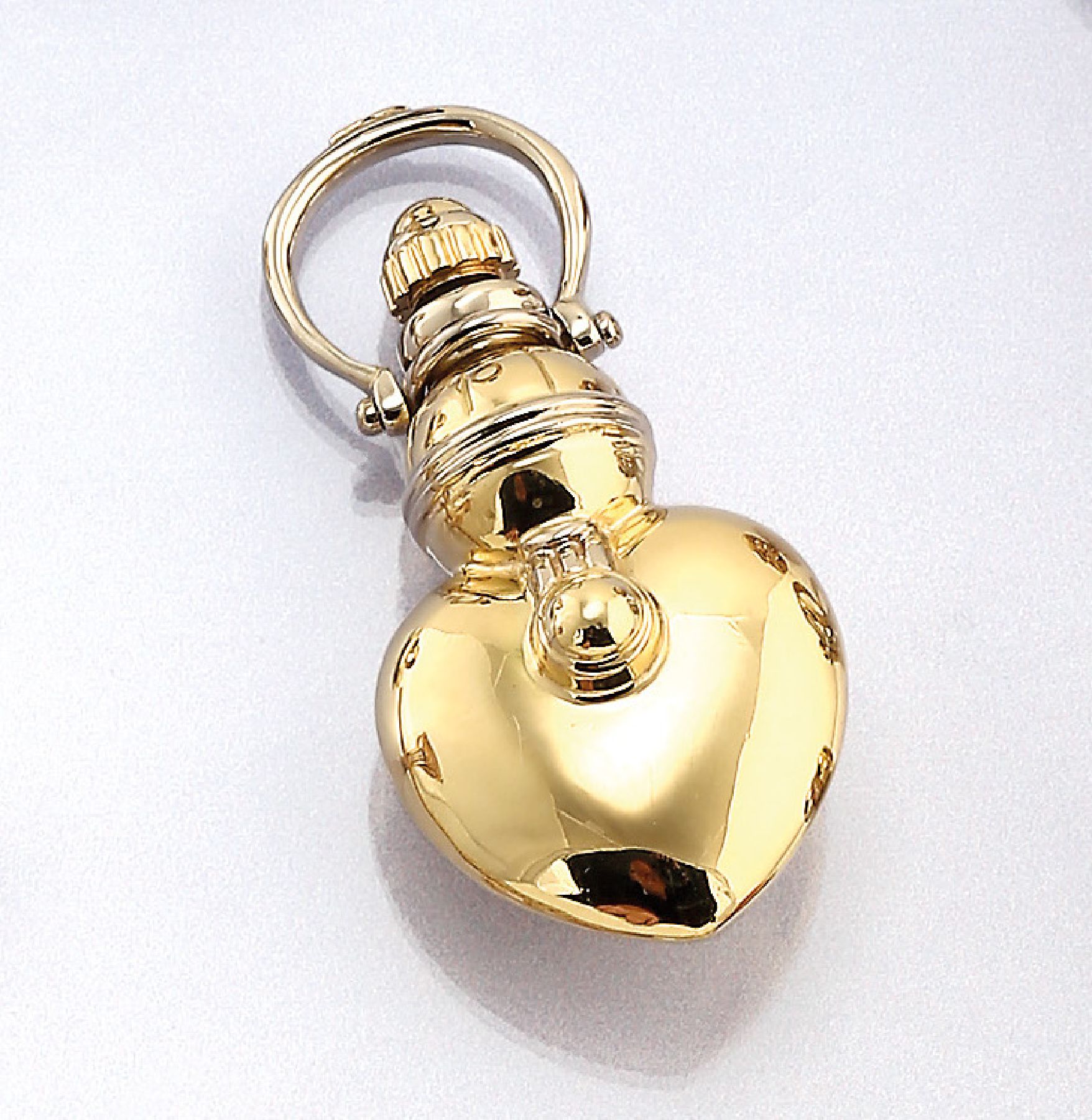 18 kt Gold Parfumflakon, GG 750/000, als Anhänger tragbar, in Herzform, ca. 6 cm, ca. 21.37 g